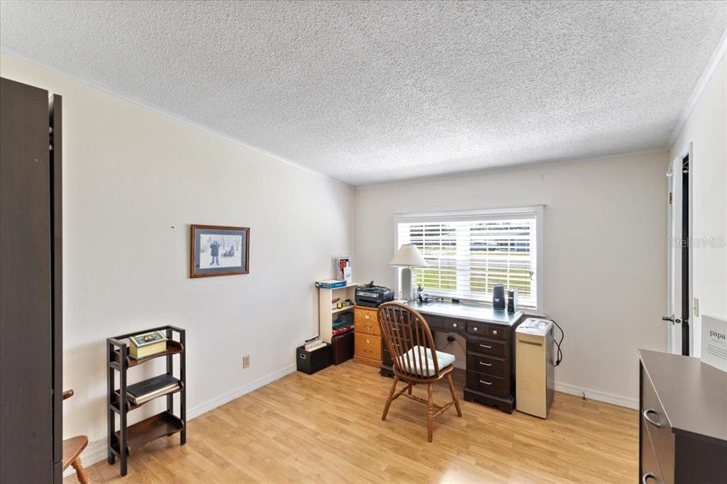 633 Starboard Avenue Edgewater, FL 32141 - Photo 14 of 57 a workspace with furniture and a window