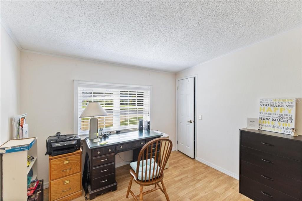 633 Starboard Avenue Edgewater, FL 32141 - Photo 15 of 57 a workspace with furniture and window