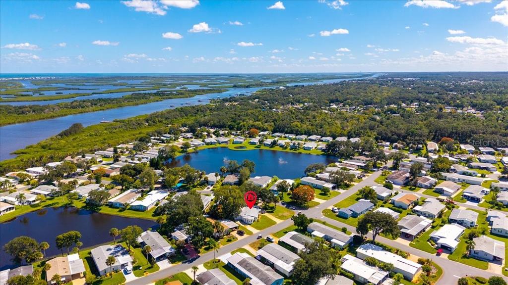 633 Starboard Avenue Edgewater, FL 32141 - Photo 2 of 57 an aerial view of residential houses with outdoor space