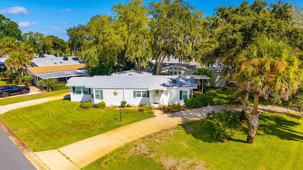 633 Starboard Avenue Edgewater, FL 32141 - Photo 29 of 57 a front view of a house with a big yard