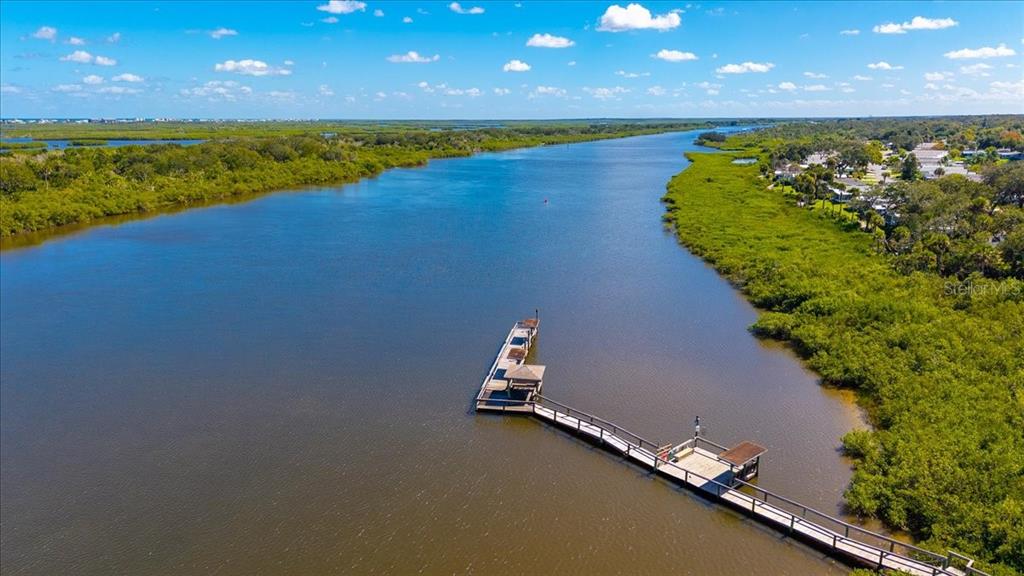 633 Starboard Avenue Edgewater, FL 32141 - Photo 31 of 57 a ocean view with beach and outdoor space