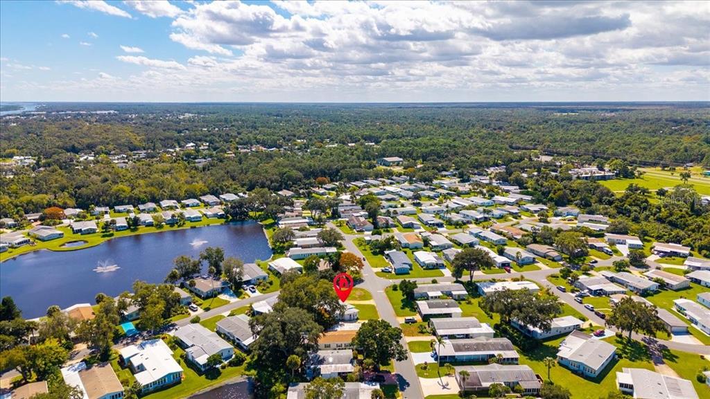 633 Starboard Avenue Edgewater, FL 32141 - Photo 40 of 57 an aerial view of city and lake