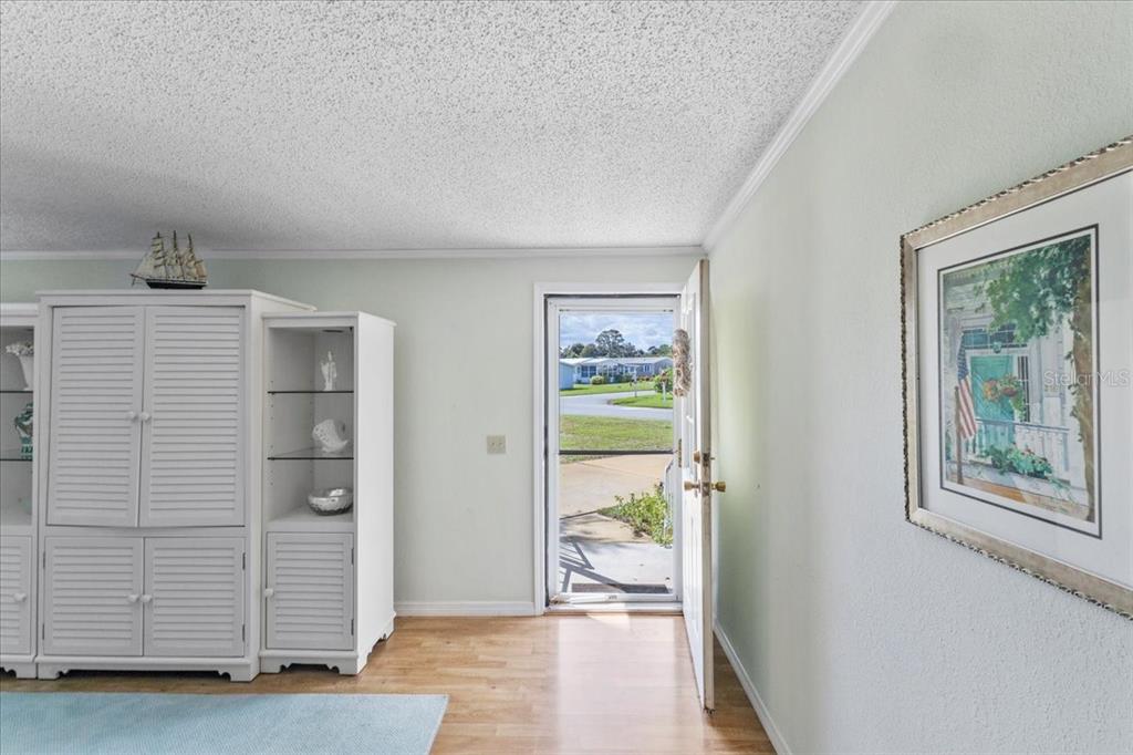 633 Starboard Avenue Edgewater, FL 32141 - Photo 4 of 57 a view of an empty room and a window