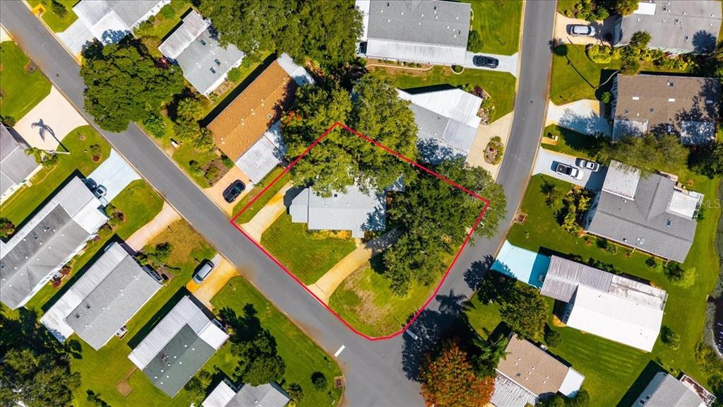 633 Starboard Avenue Edgewater, FL 32141 - Photo 42 of 57 an aerial view of a house with a yard and swimming pool