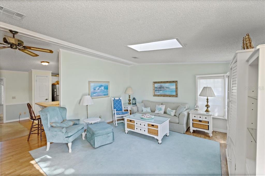 633 Starboard Avenue Edgewater, FL 32141 - Photo 5 of 57 a living room with furniture and a table