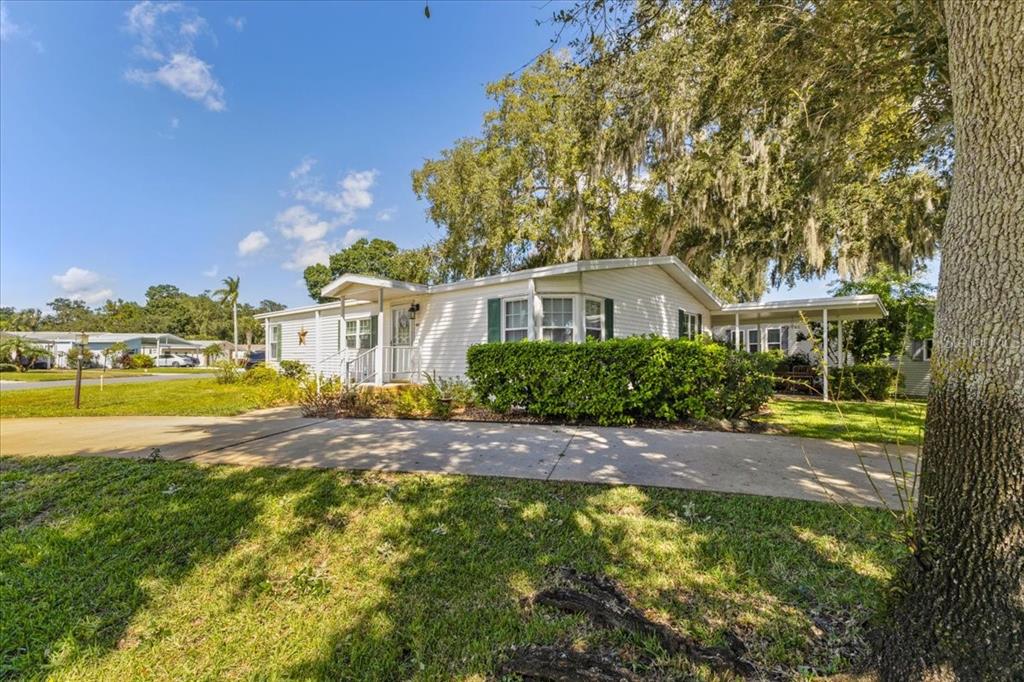633 Starboard Avenue Edgewater, FL 32141 - Photo 51 of 57 a view of a house with a swimming pool