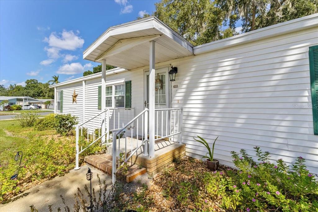 633 Starboard Avenue Edgewater, FL 32141 - Photo 55 of 57 a view of a house with backyard and sitting area