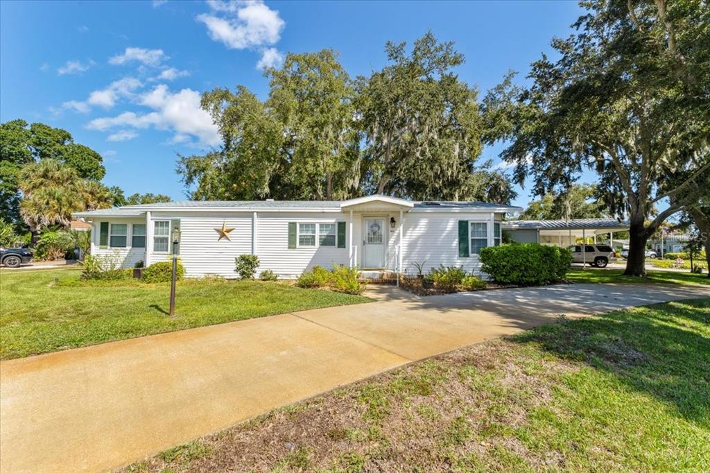 633 Starboard Avenue Edgewater, FL 32141 - Photo 57 of 57 front view of a house and a yard