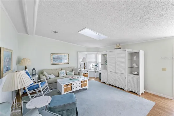 a living room with furniture and window