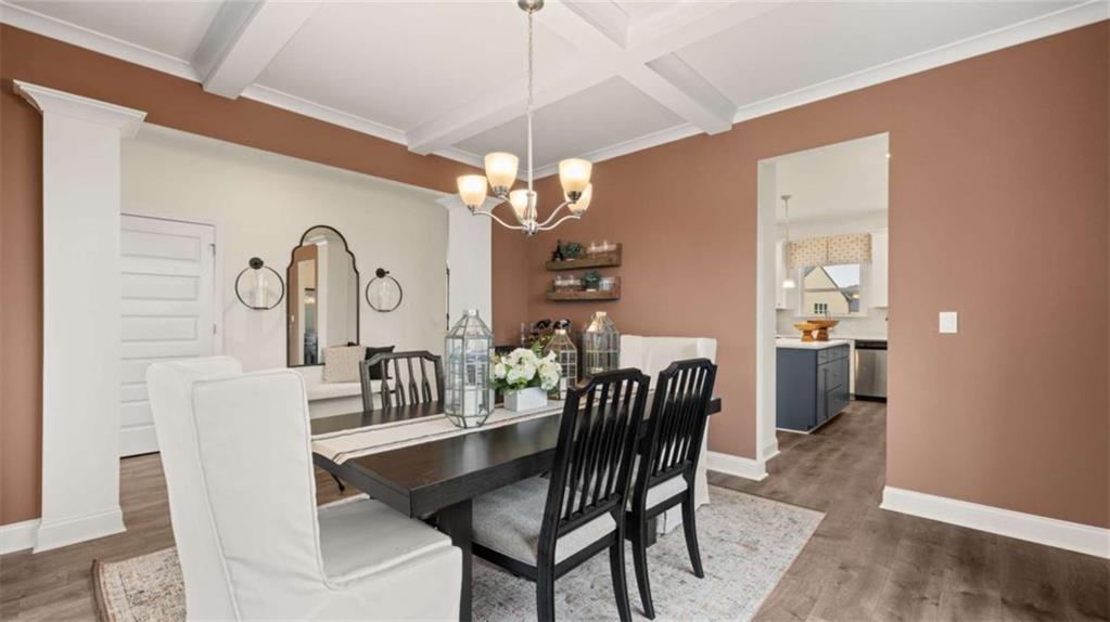 1770 Goodwin Drive Hampton, GA 30228 - Photo 15 of 79 a view of a dining room with furniture and chandelier