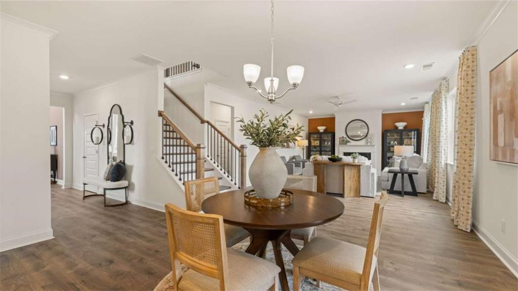 1770 Goodwin Drive Hampton, GA 30228 - Photo 27 of 79 a view of a dining room with furniture and wooden floor