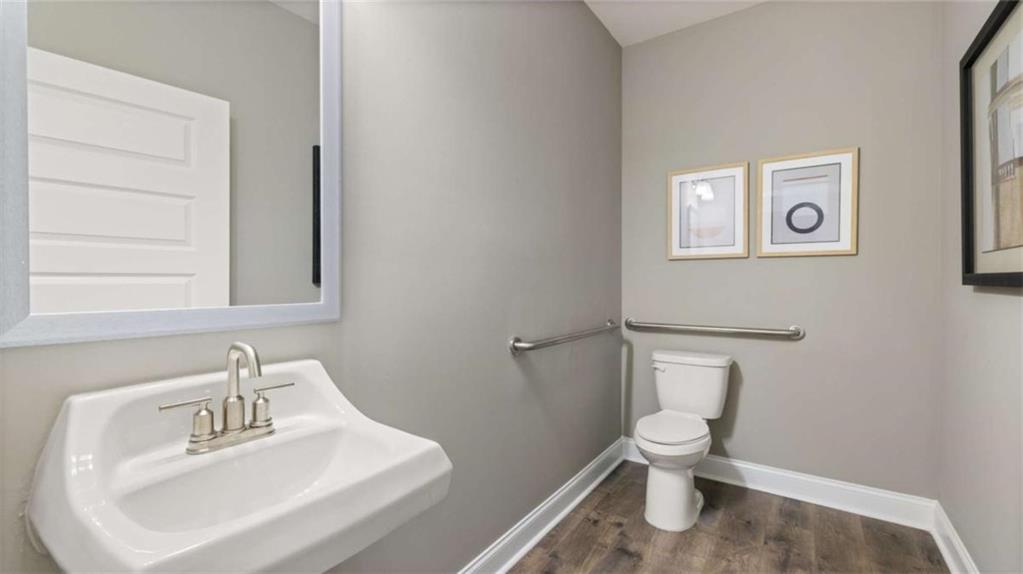 1770 Goodwin Drive Hampton, GA 30228 - Photo 41 of 79 a white toilet sitting next to a bathroom sink