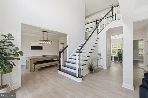 a view of entryway with wooden floor