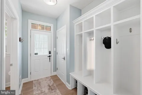 a view of entryway with wooden floor