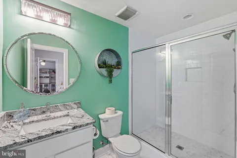 a view of hall way with furniture