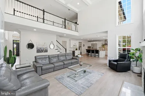 a living room with furniture and view of living room
