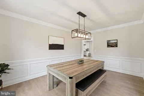 a kitchen with a table and a stove