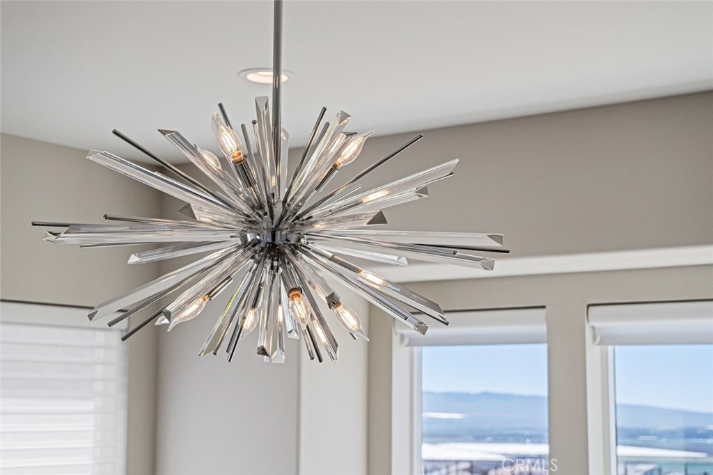 1590 Eucalyptus Road Nipomo, CA 93444 - Photo 25 of 75 a picture of a room with a large window and chandelier
