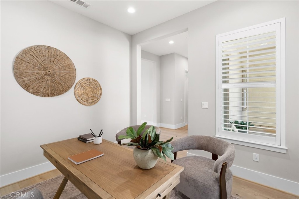 1590 Eucalyptus Road Nipomo, CA 93444 - Photo 33 of 75 a view of a room that has a table and a chair