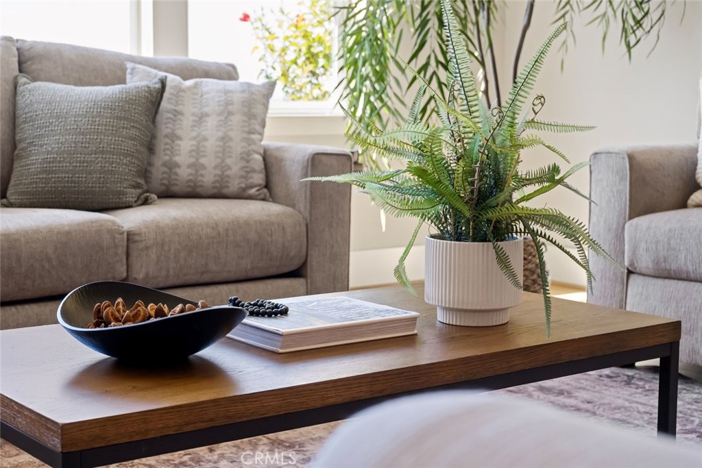1590 Eucalyptus Road Nipomo, CA 93444 - Photo 4 of 75 a living room with furniture and a potted plant