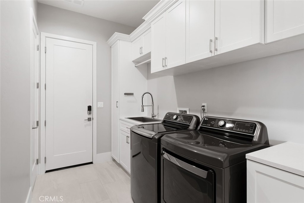 1590 Eucalyptus Road Nipomo, CA 93444 - Photo 40 of 75 Large Laundry Room w/Storage.