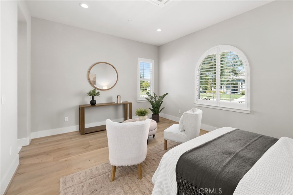 1590 Eucalyptus Road Nipomo, CA 93444 - Photo 43 of 75 a living room with furniture a window and a potted plant