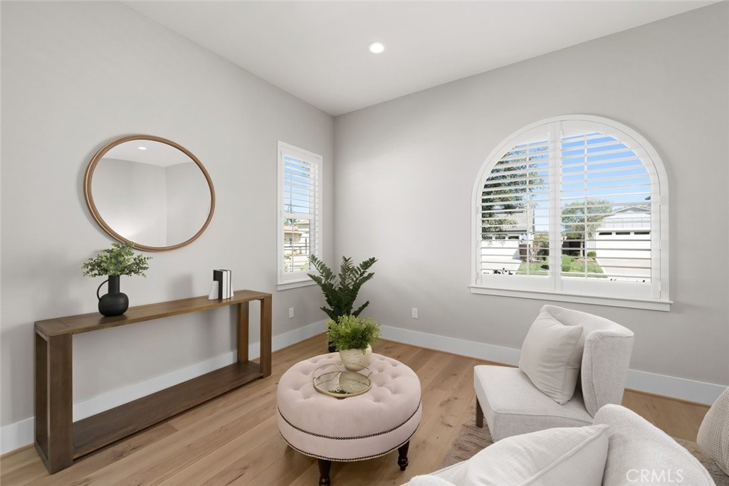 1590 Eucalyptus Road Nipomo, CA 93444 - Photo 44 of 75 a living room with furniture and a potted plant