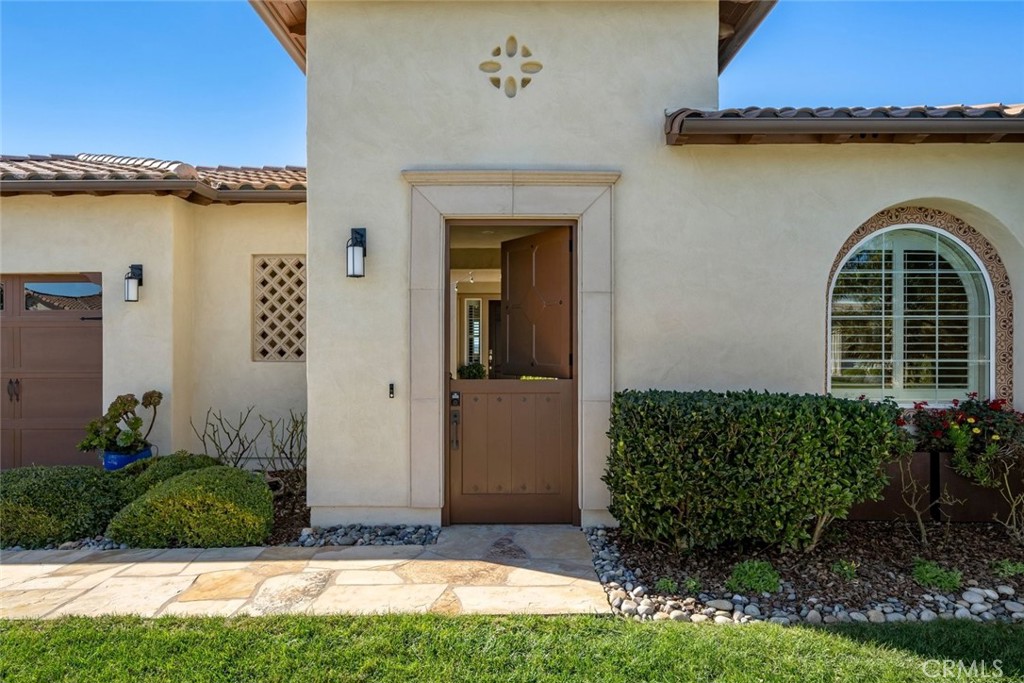 1590 Eucalyptus Road Nipomo, CA 93444 - Photo 59 of 75 a front view of a house with garden