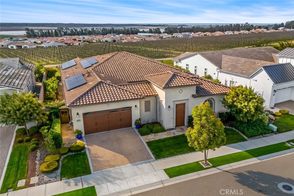 1590 Eucalyptus Road Nipomo, CA 93444 - Photo 60 of 75 an aerial view of a house with a garden and lake view