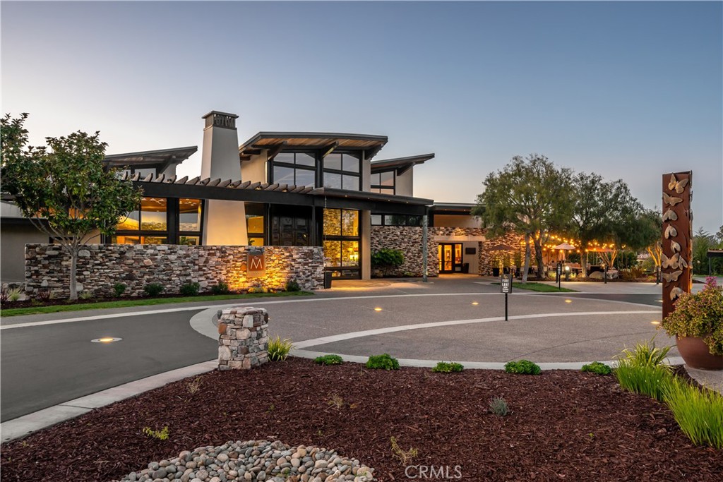 1590 Eucalyptus Road Nipomo, CA 93444 - Photo 72 of 75 a front view of a house with a yard