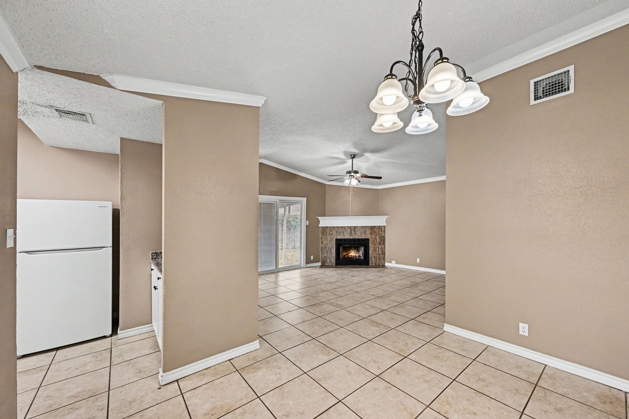 8406 Forest Ridge Drive San Antonio, TX 78239 - Photo 31 of 33 a view of an empty room with a fireplace