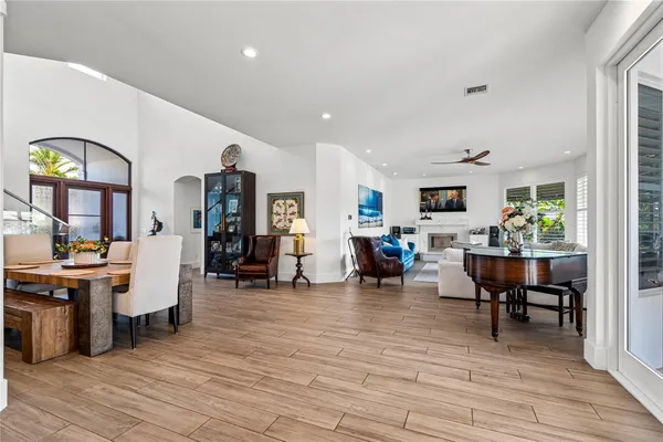 a dining room with furniture and window