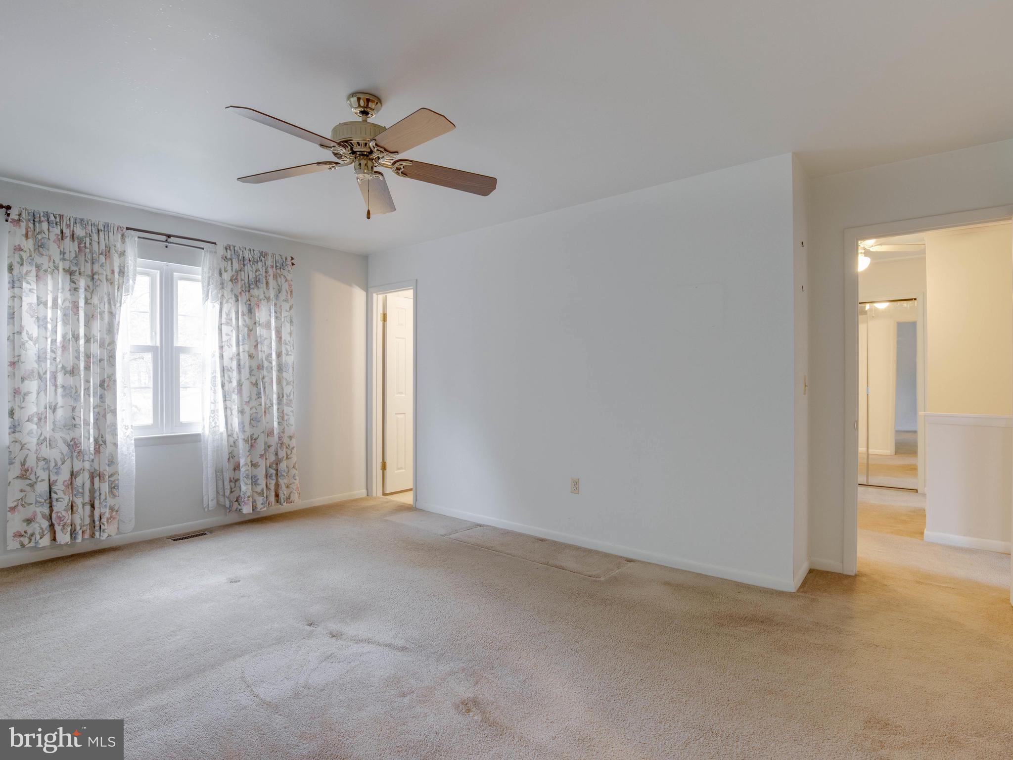 721 Mesquite Road Severn, MD 21144 - Photo 15 of 36 17' x 12' Master Bedroom w/ Ceiling Fan