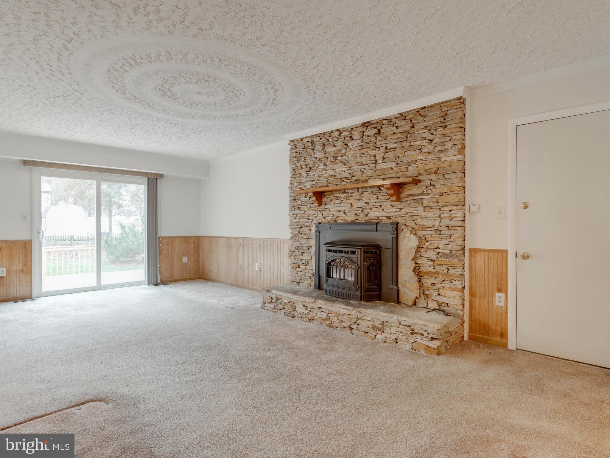721 Mesquite Road Severn, MD 21144 - Photo 4 of 36 Huge Family Room w/ Stacked Stone Fireplace