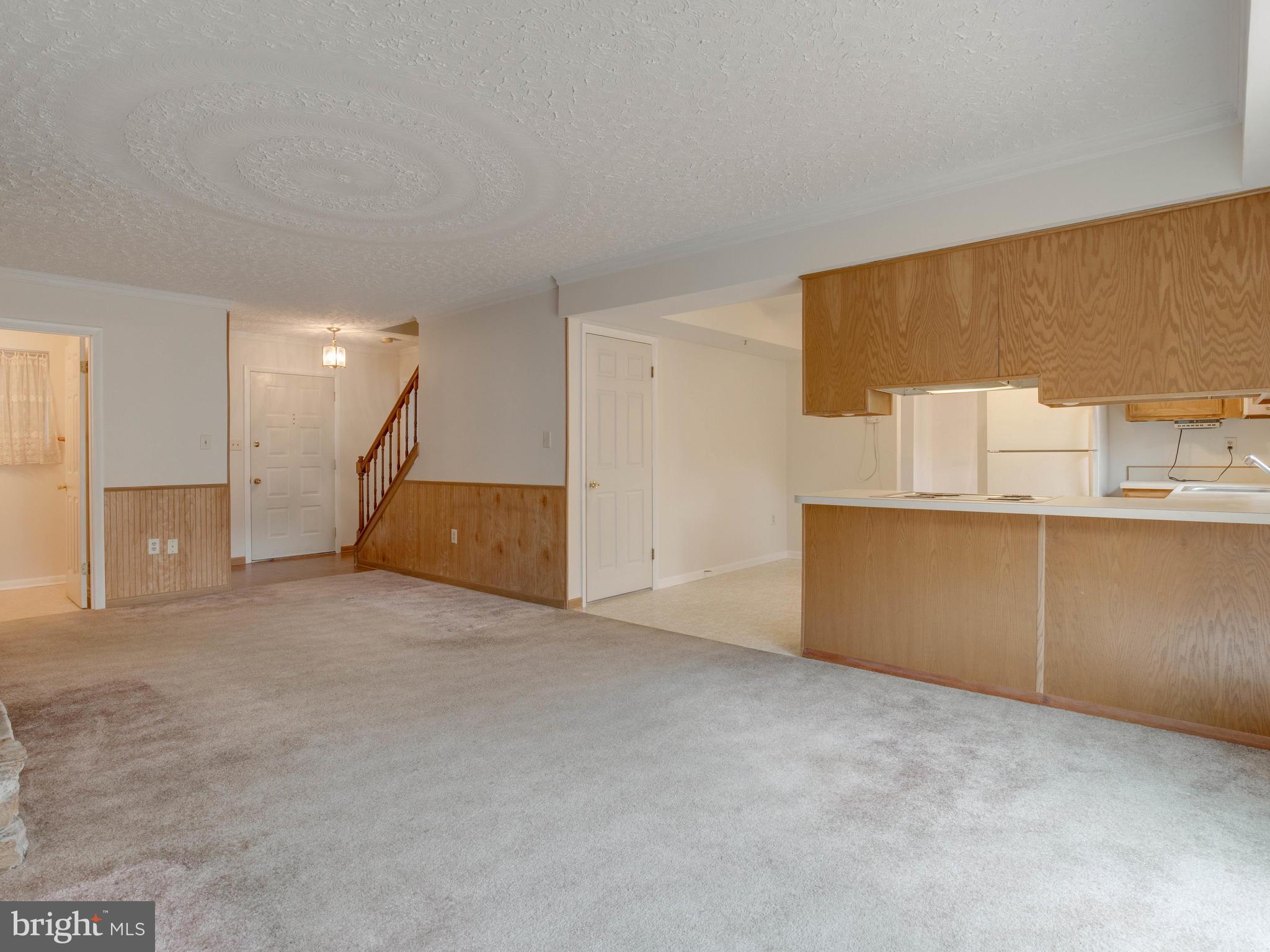 721 Mesquite Road Severn, MD 21144 - Photo 5 of 36 Family room w/ Wainscotting