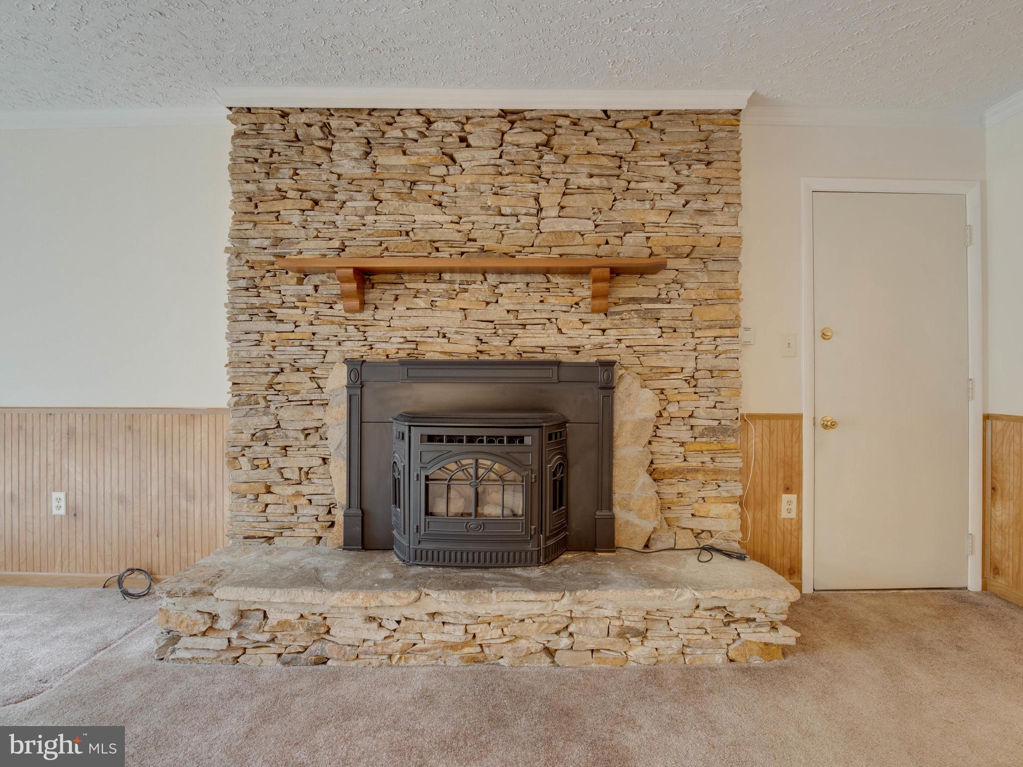 721 Mesquite Road Severn, MD 21144 - Photo 6 of 36 Gorgeous Stacked Stone FP w/ Wood Stove insert