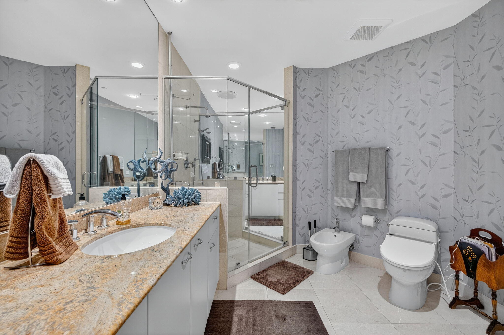 1600 South Ocean Boulevard, Unit MPH02 Lauderdale-by-the-Sea, FL 33062 - Photo 30 of 71 a bathroom with a granite countertop sink mirror vanity and toilet