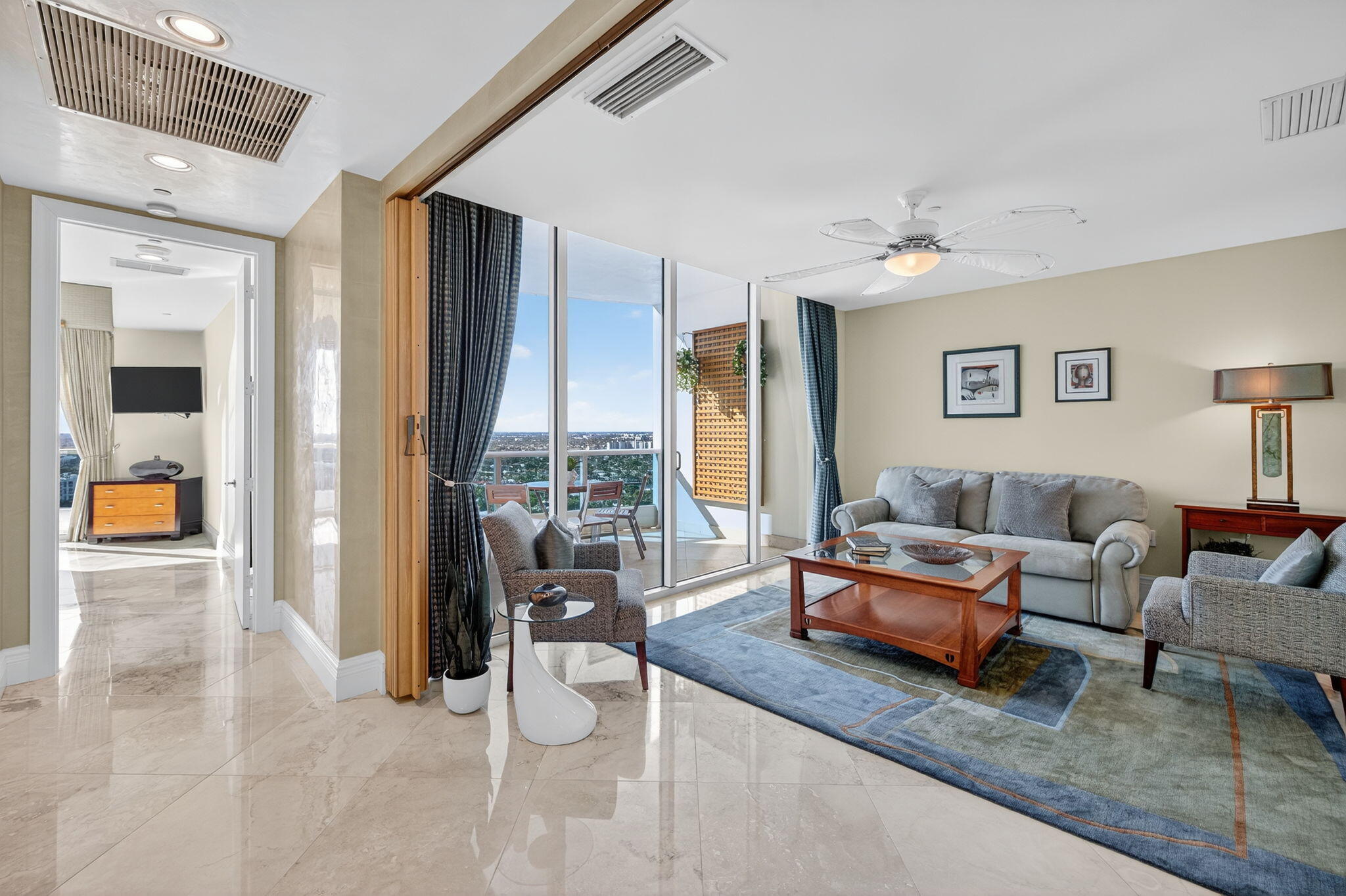 1600 South Ocean Boulevard, Unit MPH02 Lauderdale-by-the-Sea, FL 33062 - Photo 38 of 71 a living room with furniture and a large window
