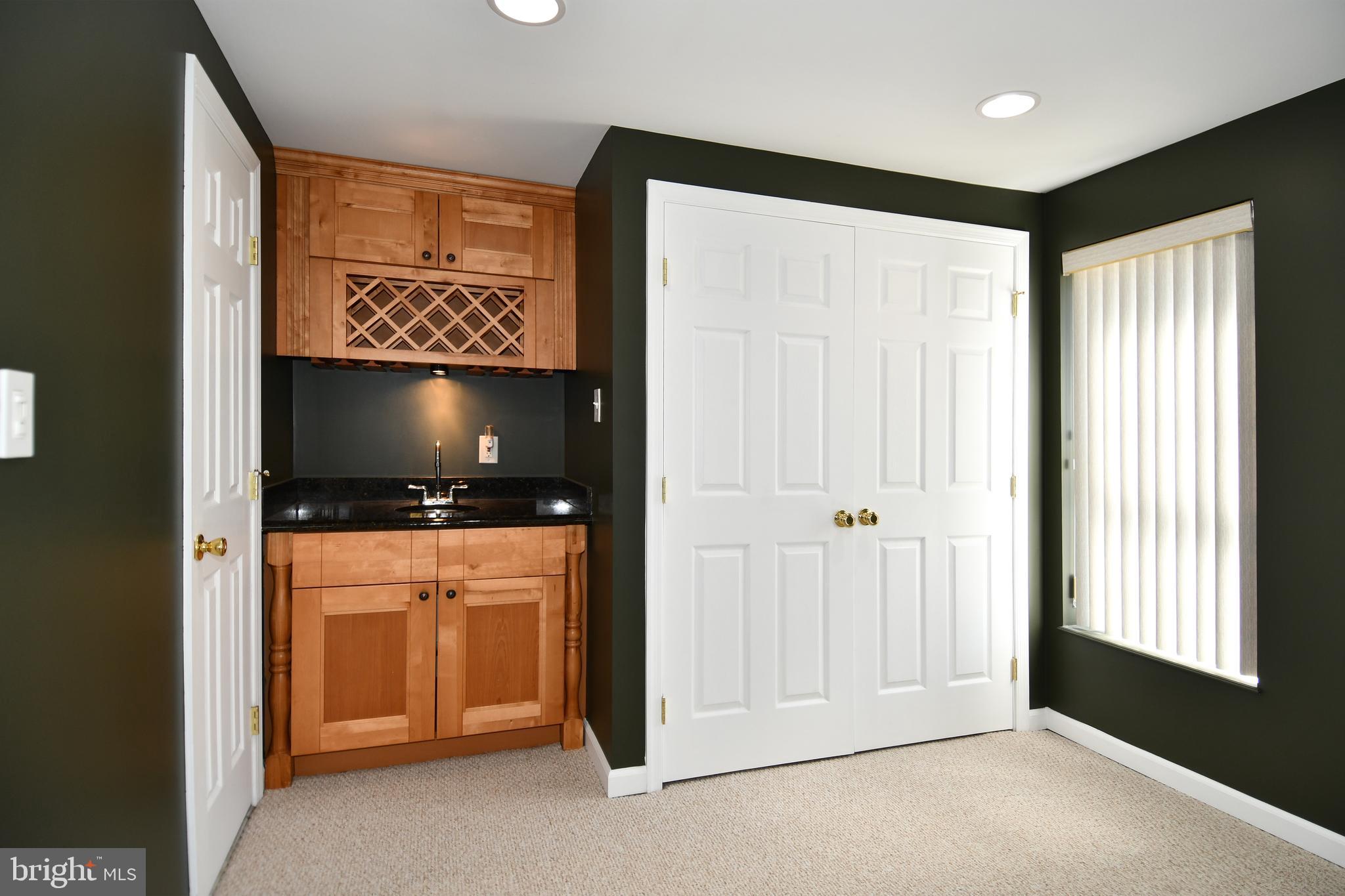 1048 Windrush Lane, Unit 39 Sandy Spring, MD 20860 - Photo 31 of 39 Beautiful wet bar.