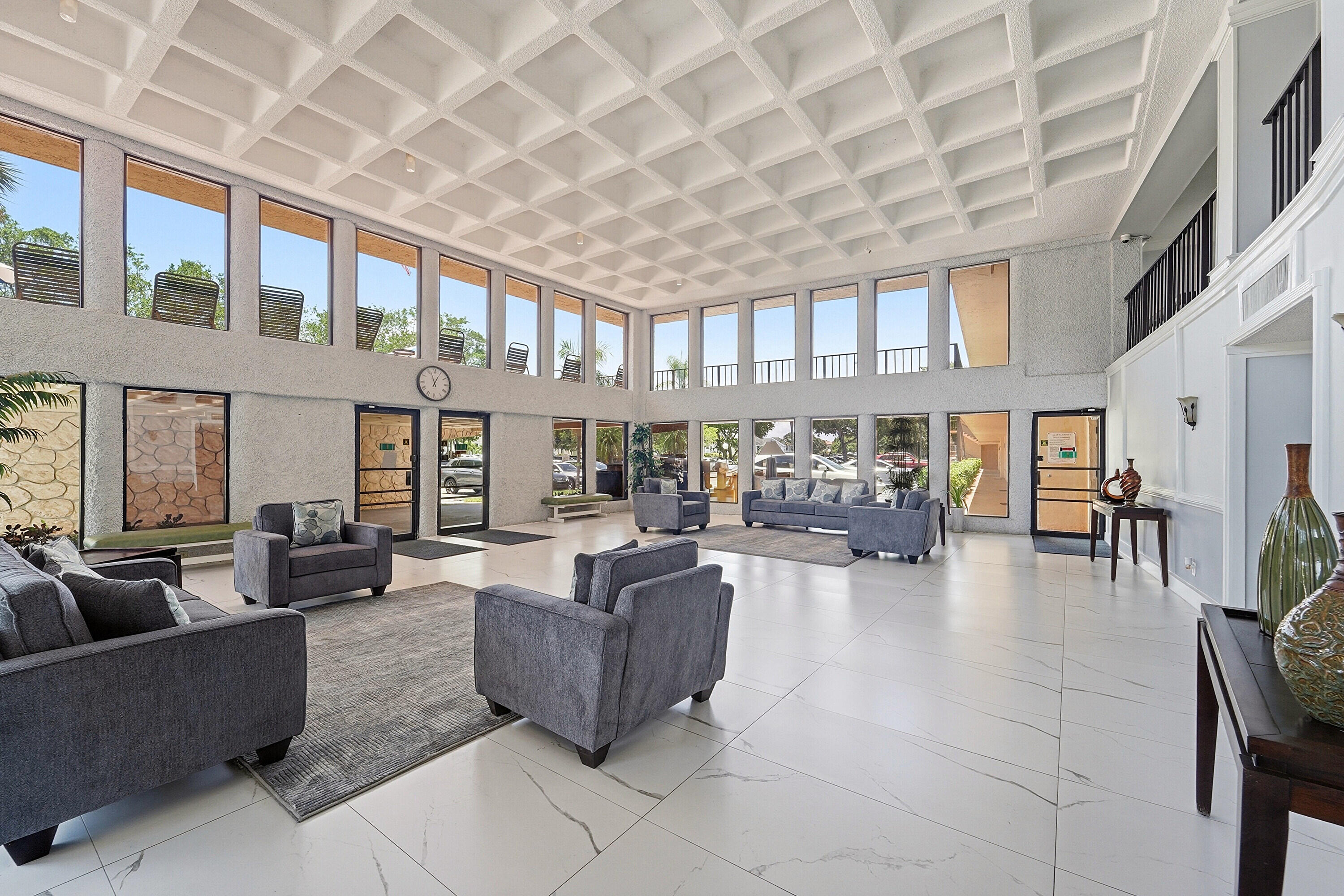 9273 Southwest 8th Street, Unit 321 Boca Raton, FL 33428 - Photo 25 of 29 Building Lobby