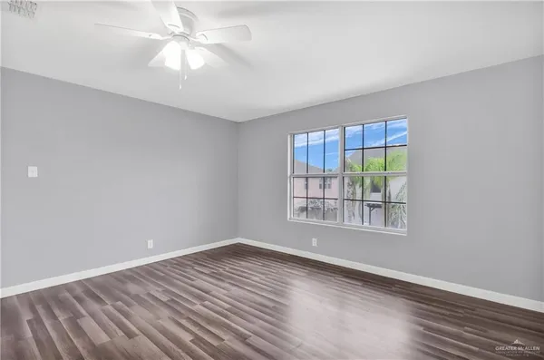 a kitchen with stainless steel appliances a sink stove and cabinets