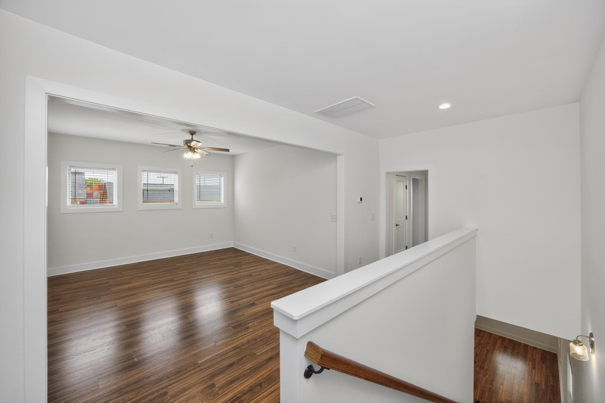 7 Decatur Street Nashville, TN 37210 - Photo 41 of 43 a view of an empty room with wooden floor and a window
