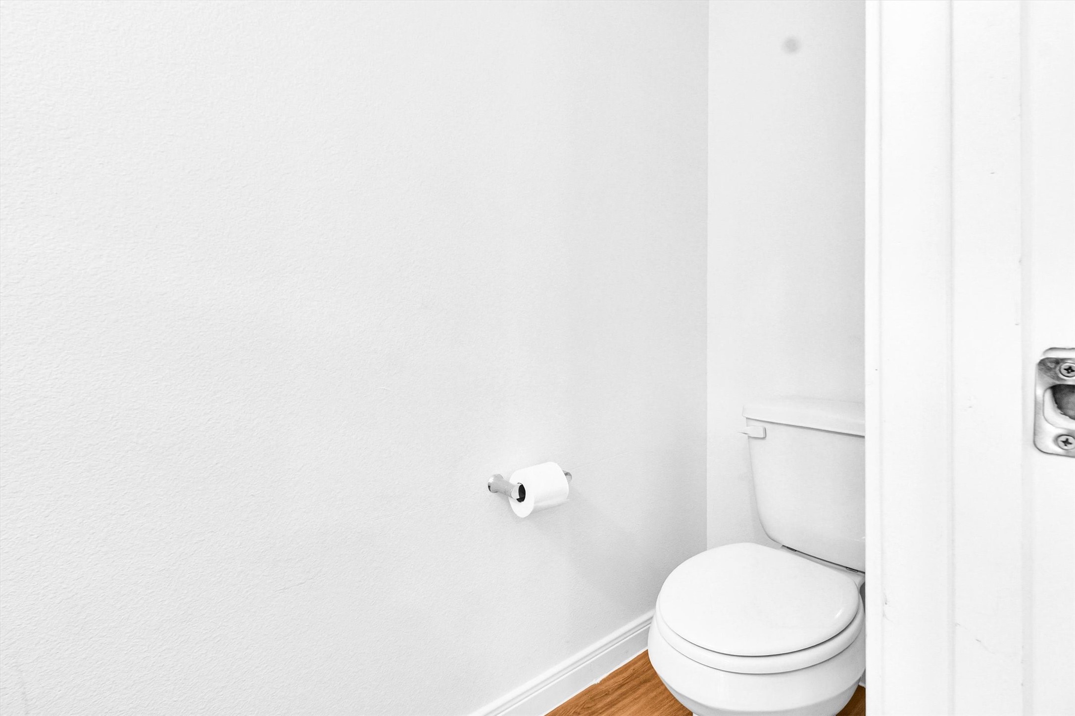 5325 Rue Street Houston, TX 77033 - Photo 12 of 34 a white toilet sitting next to a white wall