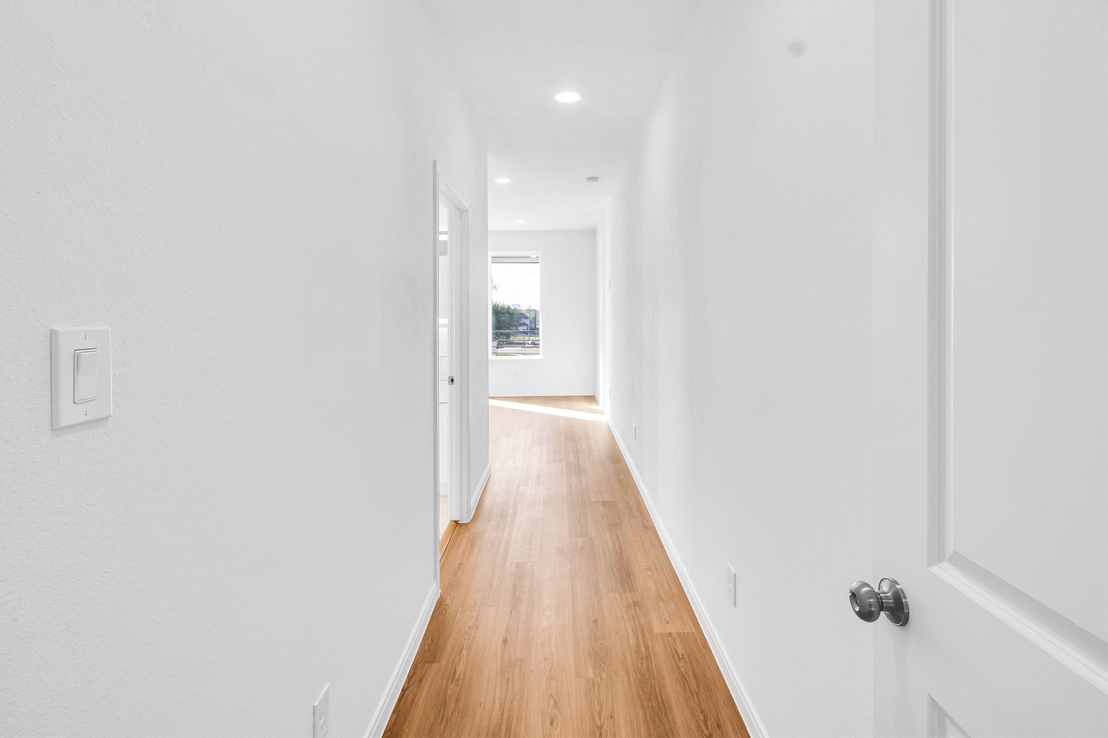 5325 Rue Street Houston, TX 77033 - Photo 18 of 34 a view of a hallway with wooden floor