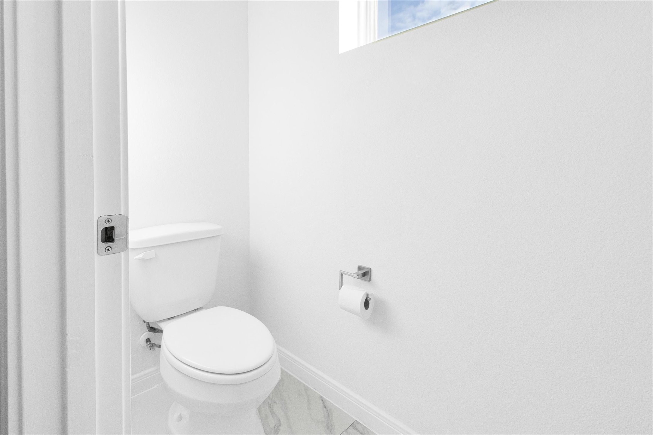 5325 Rue Street Houston, TX 77033 - Photo 24 of 34 a white toilet sitting next to a shower