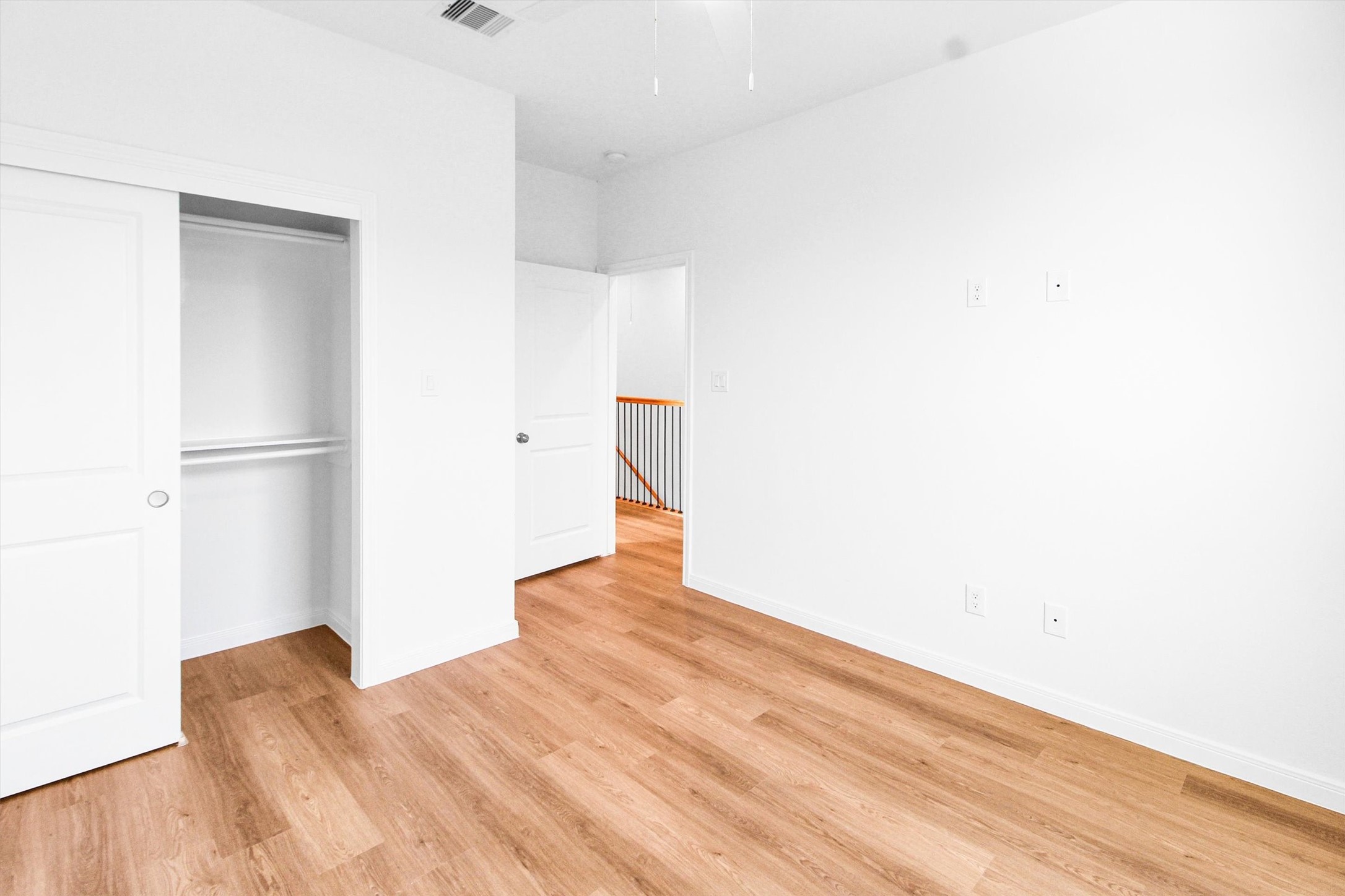 5325 Rue Street Houston, TX 77033 - Photo 28 of 34 a view of empty room with wooden floor