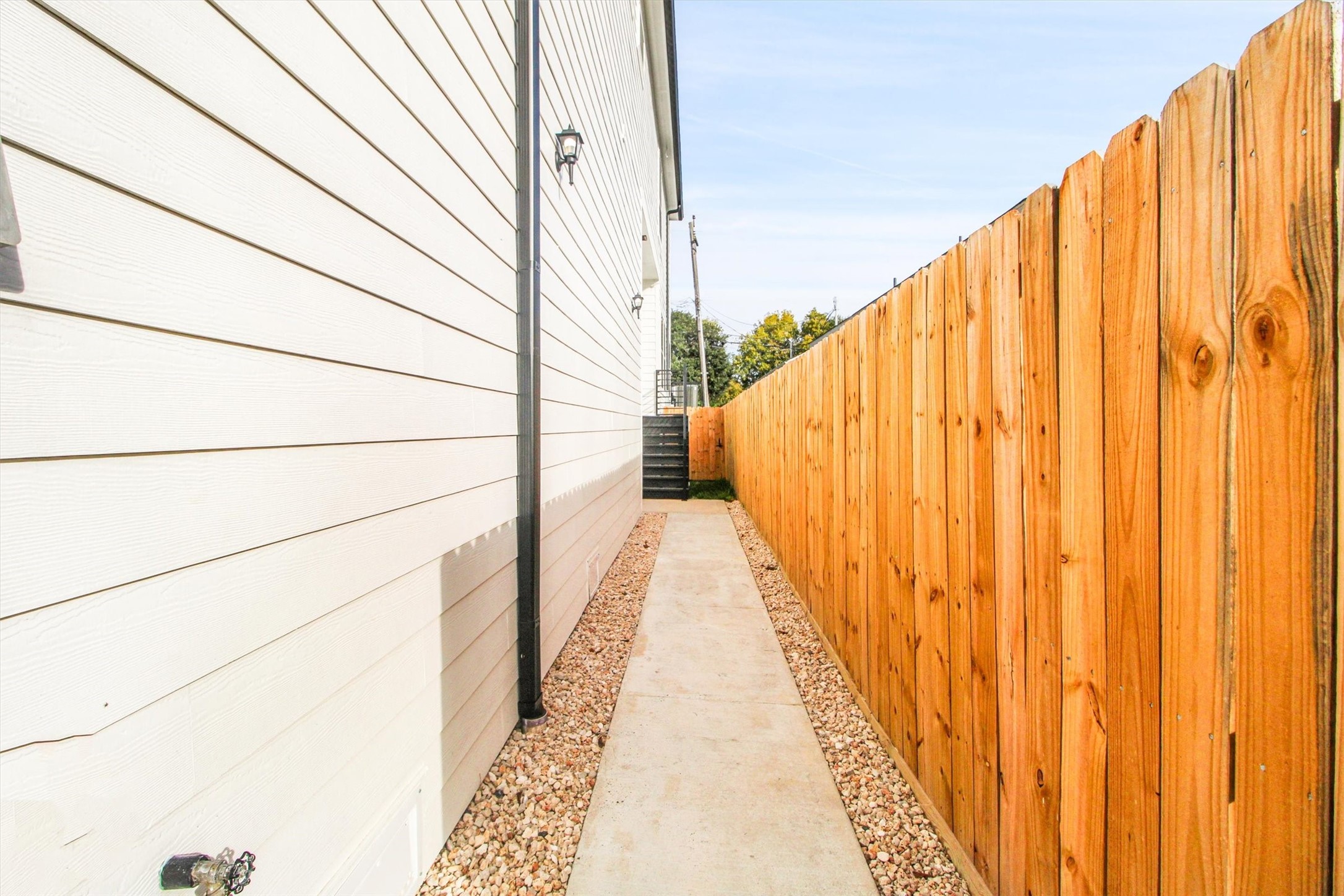 5325 Rue Street Houston, TX 77033 - Photo 33 of 34 a view of balcony with wooden floor