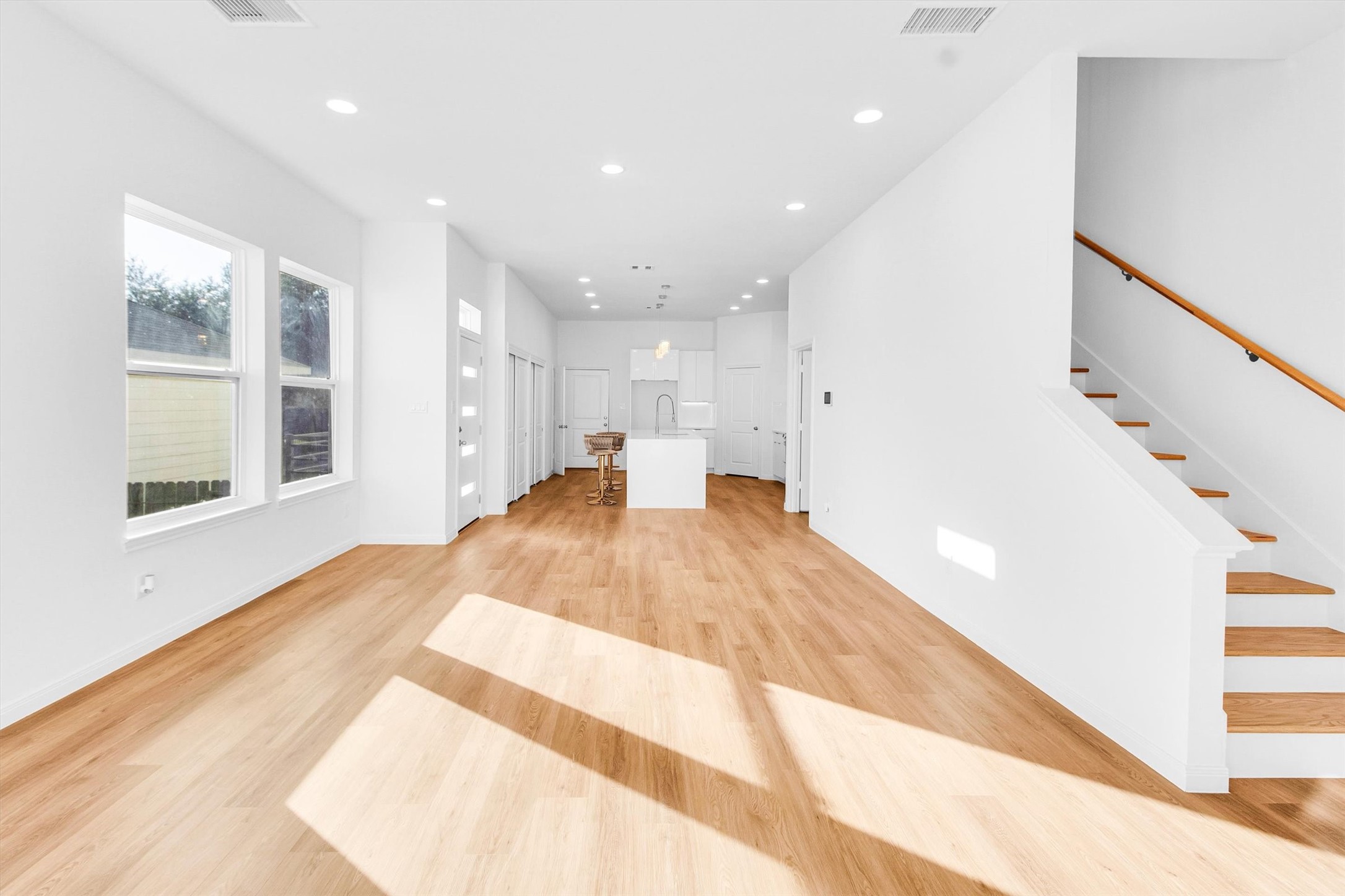 5325 Rue Street Houston, TX 77033 - Photo 7 of 34 a view of a kitchen with furniture and wooden floor