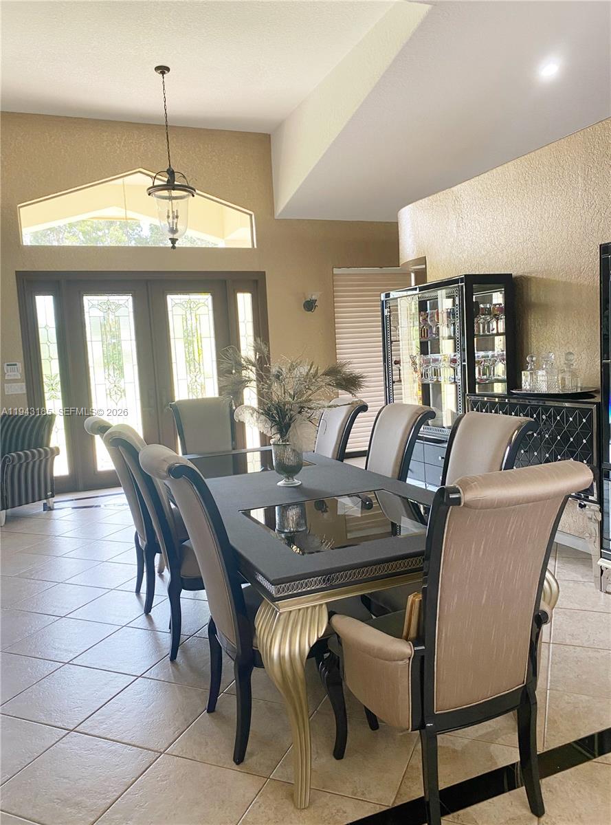 6550 Southwest 183rd Way Southwest Ranches, FL 33331 - Photo 4 of 24 a view of a a dining room with furniture window and wooden floor