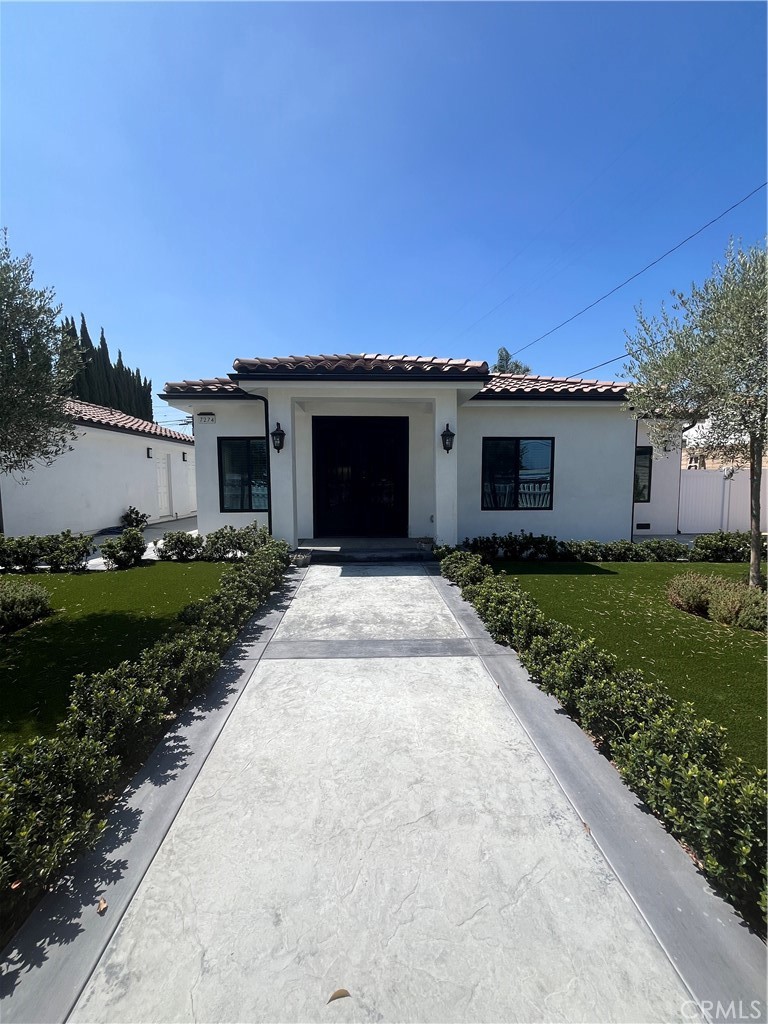 7274 Century Paramount, CA 90723 - Photo 1 of 11 a view of a house with a patio